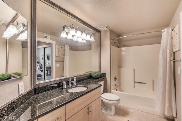 230 E Flamingo Rd Unit 203, Las Vegas, NV 89169 - bathroom with shower / bath combination with curtain, vanity, tile patterned floors, and a textured ceiling