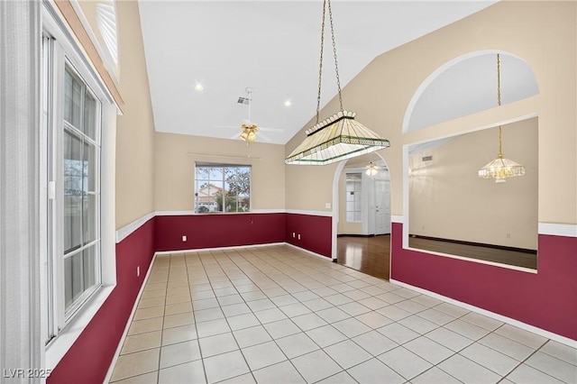 114 Tamarack Dr, Henderson, NV 89002 - tiled spare room with a ceiling fan, high vaulted ceiling, recessed lighting, and arched walkways