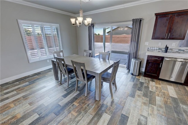 210 Magnolia Blvd, Pahrump, NV 89048 - dining area with a chandelier, plenty of natural light, crown molding, and wood finished floors