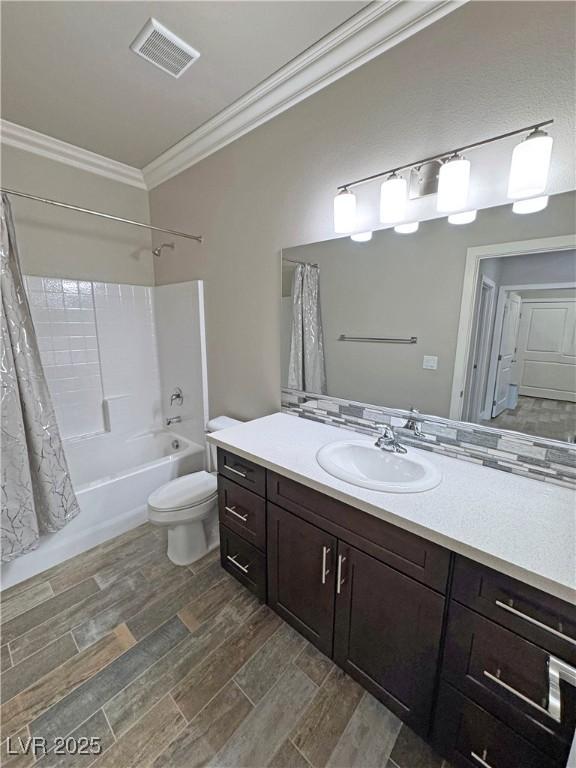 210 Magnolia Blvd, Pahrump, NV 89048 - full bathroom featuring crown molding, vanity, shower / bath combination with curtain, and wood finished floors