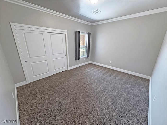 210 Magnolia Blvd, Pahrump, NV 89048 - unfurnished bedroom featuring ornamental molding, carpet floors, and a closet