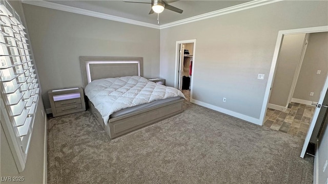 210 Magnolia Blvd, Pahrump, NV 89048 - carpeted bedroom with ornamental molding, a walk in closet, a closet, and ceiling fan