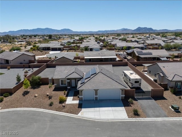210 Magnolia Blvd, Pahrump, NV 89048 - aerial perspective of suburban area featuring a mountain backdrop