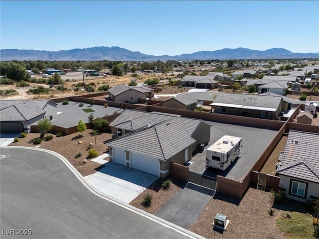 210 Magnolia Blvd, Pahrump, NV 89048 - aerial perspective of suburban area featuring a mountainous background