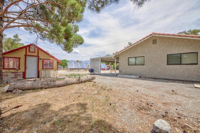 1050 Morgan Ln, Pahrump, NV 89060 - view of yard with a carport