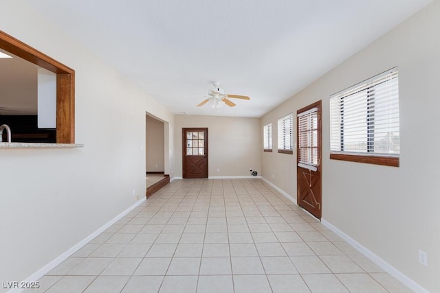 1050 Morgan Ln, Pahrump, NV 89060 - foyer with ceiling fan and baseboards