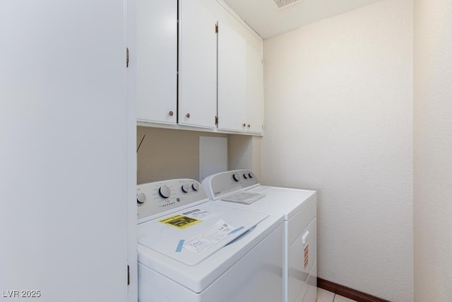1050 Morgan Ln, Pahrump, NV 89060 - laundry room featuring independent washer and dryer and cabinet space