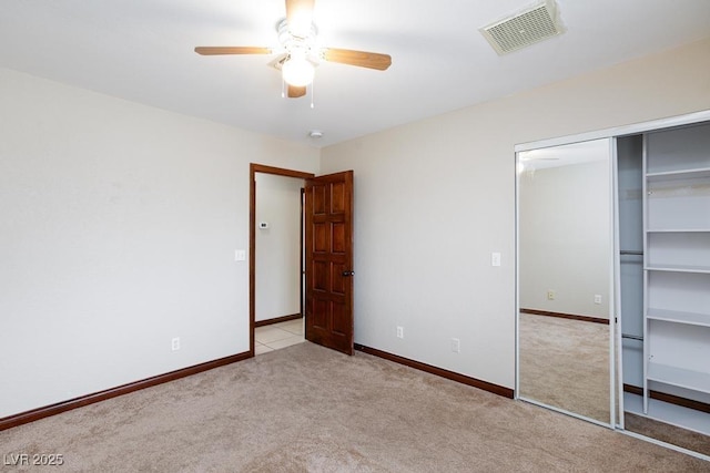 1050 Morgan Ln, Pahrump, NV 89060 - unfurnished bedroom featuring carpet, a closet, and a ceiling fan