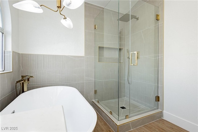 2107 Fountain Springs Dr, Henderson, NV 89074 - full bath with a shower stall, a soaking tub, and wood finished floors