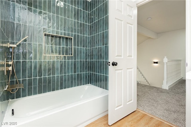 2107 Fountain Springs Dr, Henderson, NV 89074 - full bath with wood finished floors, shower / bathtub combination, and lofted ceiling