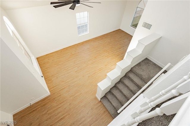 2107 Fountain Springs Dr, Henderson, NV 89074 - stairs featuring a ceiling fan and wood finished floors