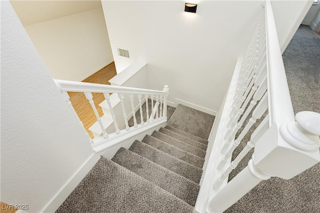 2107 Fountain Springs Dr, Henderson, NV 89074 - stairway with carpet flooring and baseboards