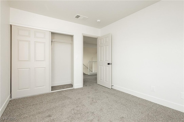 2107 Fountain Springs Dr, Henderson, NV 89074 - unfurnished bedroom featuring carpet floors and a closet