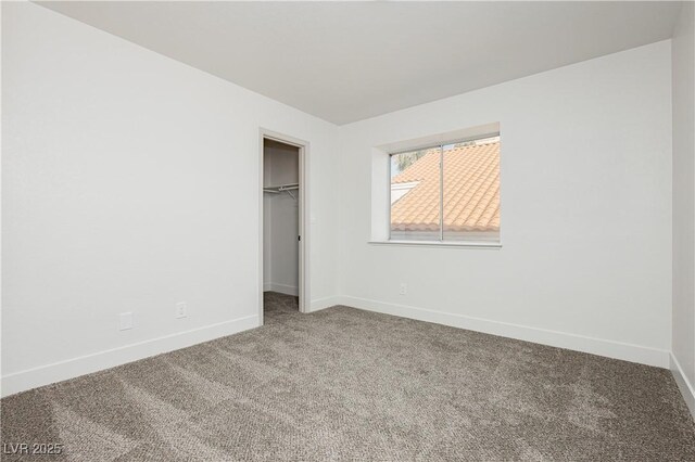 2107 Fountain Springs Dr, Henderson, NV 89074 - unfurnished bedroom featuring carpet and a closet