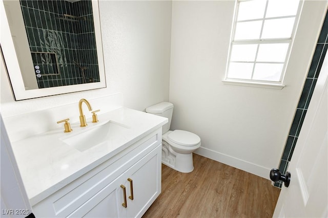 2107 Fountain Springs Dr, Henderson, NV 89074 - bathroom with wood finished floors, vanity, and tiled shower