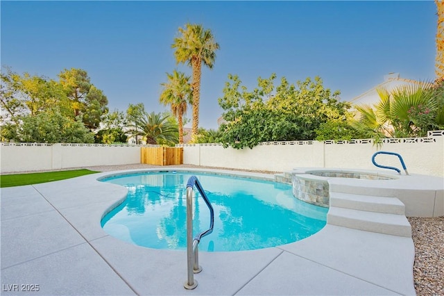 2107 Fountain Springs Dr, Henderson, NV 89074 - view of swimming pool with a fenced backyard, a patio, and a pool with connected hot tub