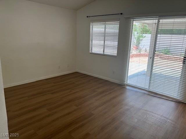 9600 Pacific View Dr, Las Vegas, NV 89117 - empty room with lofted ceiling and wood finished floors