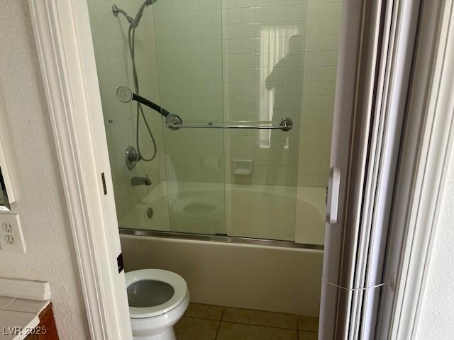 9600 Pacific View Dr, Las Vegas, NV 89117 - full bathroom with tile patterned floors and shower / bath combination with glass door