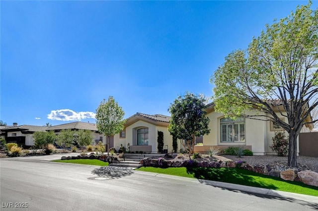 33 Hassayampa Trl, Henderson, NV 89052 - view of front of property featuring stucco siding and a tile roof