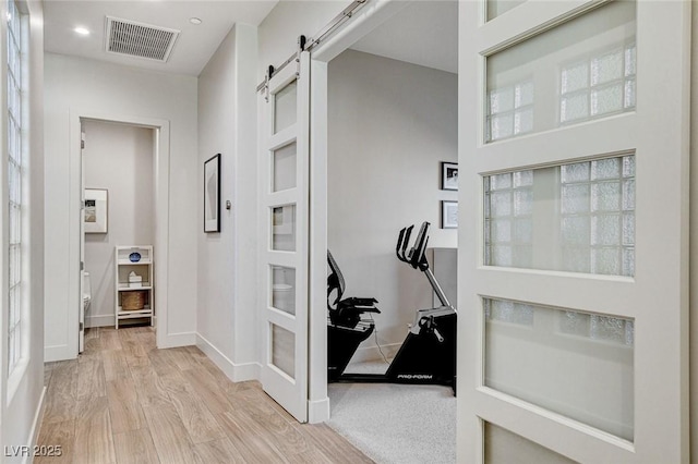 33 Hassayampa Trl, Henderson, NV 89052 - hallway with a barn door, light wood finished floors, and recessed lighting