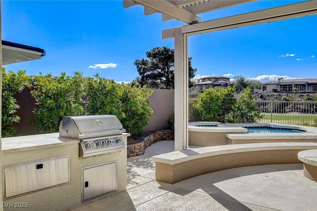 33 Hassayampa Trl, Henderson, NV 89052 - view of patio with an outdoor kitchen and an in-ground hot tub