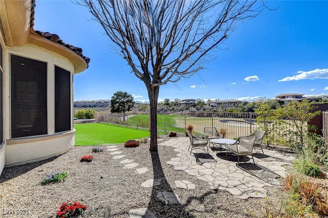 33 Hassayampa Trl, Henderson, NV 89052 - fenced backyard with a patio