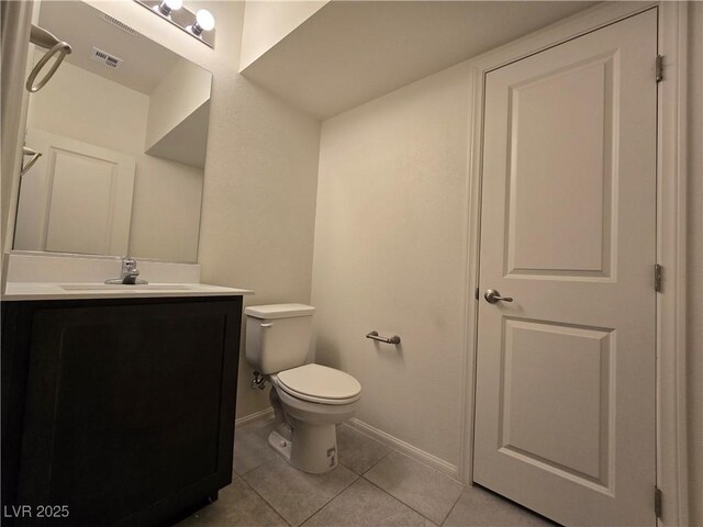 5817 Bonita Rose St, Las Vegas, NV 89113 - bathroom featuring vanity and tile patterned flooring