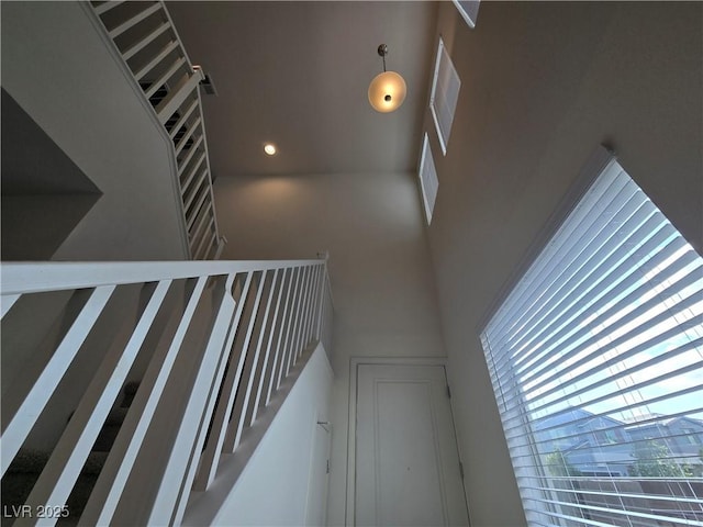 5817 Bonita Rose St, Las Vegas, NV 89113 - staircase with a high ceiling
