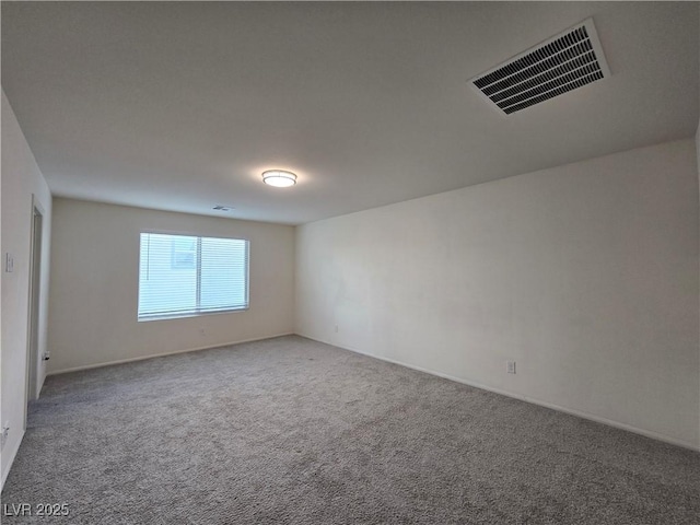 5817 Bonita Rose St, Las Vegas, NV 89113 - carpeted spare room featuring baseboards