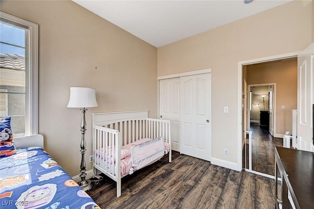 7813 Falconwing Ave, Las Vegas, NV 89131 - bedroom with dark wood finished floors and a closet