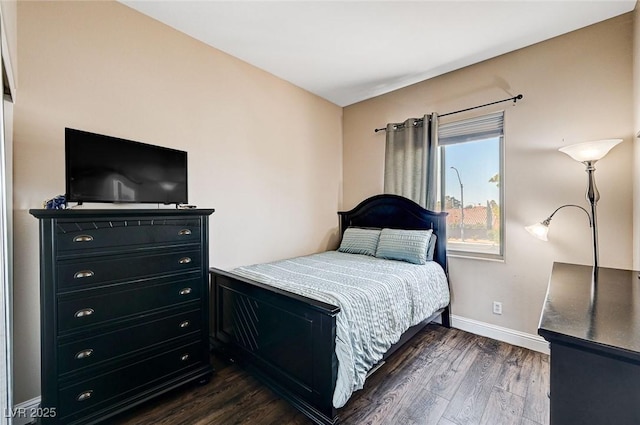 7813 Falconwing Ave, Las Vegas, NV 89131 - bedroom featuring dark wood-style floors and baseboards