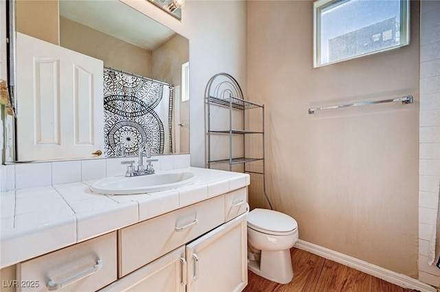 7813 Falconwing Ave, Las Vegas, NV 89131 - bathroom featuring wood finished floors, vanity, and a shower with shower curtain