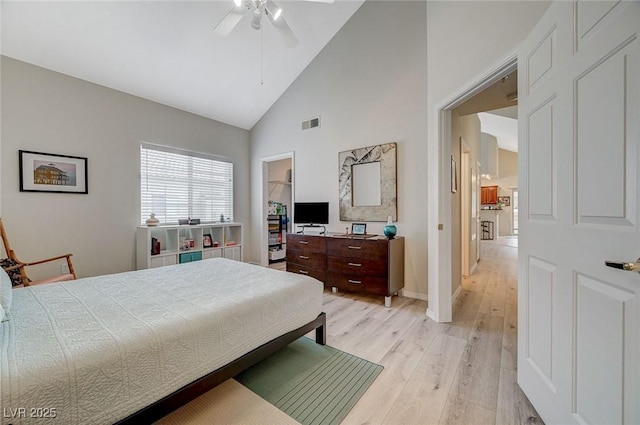 2925 Wigwam Pkwy Unit 123, Henderson, NV 89074 - bedroom with light wood-style floors, high vaulted ceiling, and a ceiling fan