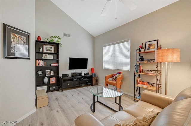 2925 Wigwam Pkwy Unit 123, Henderson, NV 89074 - living area featuring wood finished floors, a ceiling fan, and high vaulted ceiling