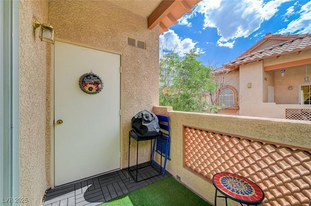 2925 Wigwam Pkwy Unit 123, Henderson, NV 89074 - entrance to property featuring stucco siding and a balcony