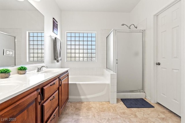 4916 White Jade St, North Las Vegas, NV 89081 - full bathroom featuring a garden tub, a shower stall, and double vanity