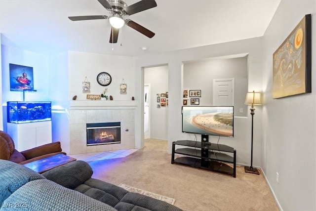4916 White Jade St, North Las Vegas, NV 89081 - living room featuring carpet flooring, a fireplace, and ceiling fan