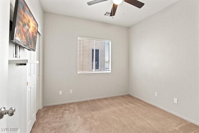 4916 White Jade St, North Las Vegas, NV 89081 - spare room with light carpet and a ceiling fan