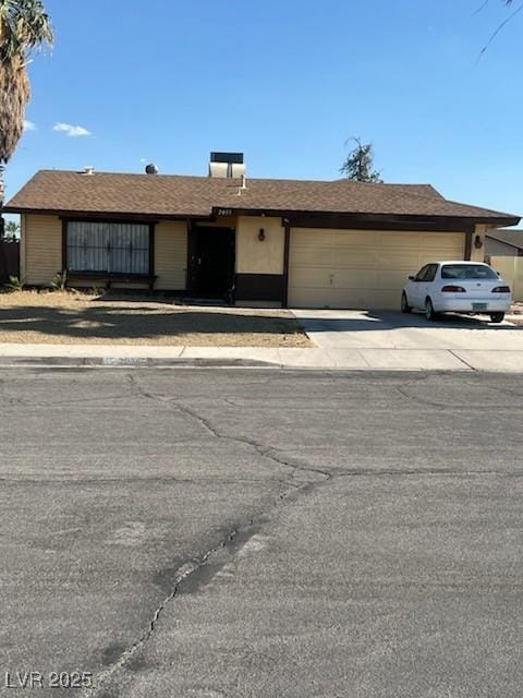 2033 Pommel Ave, Las Vegas, NV 89119 - ranch-style house featuring driveway and an attached garage