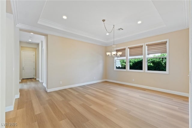 12168 Dorada Coast Ave, Las Vegas, NV 89138 - spare room with a chandelier, a tray ceiling, light wood finished floors, ornamental molding, and recessed lighting