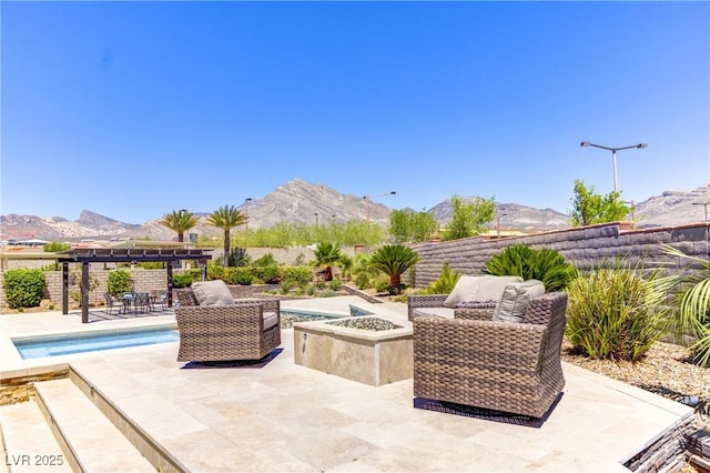 12168 Dorada Coast Ave, Las Vegas, NV 89138 - fenced backyard featuring a fire pit, a pergola, a mountain view, and a patio