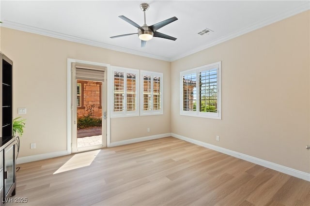 12168 Dorada Coast Ave, Las Vegas, NV 89138 - spare room featuring light wood finished floors, crown molding, and a ceiling fan