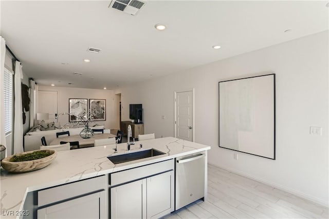 9351 Aria Ridge Ave, Las Vegas, NV 89143 - kitchen with dishwasher, open floor plan, light stone counters, and recessed lighting
