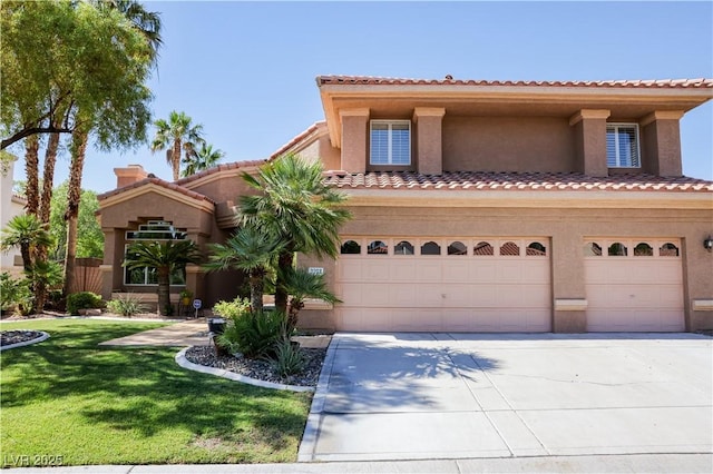 2208 Fiero Dr, Las Vegas, NV 89134 - mediterranean / spanish-style home with driveway, stucco siding, a front lawn, an attached garage, and a tiled roof