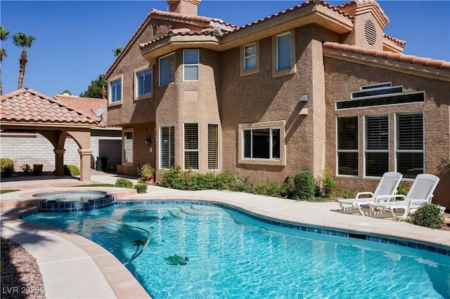 2208 Fiero Dr, Las Vegas, NV 89134 - view of pool featuring a patio area and a pool with connected hot tub