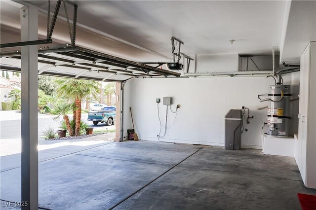 2208 Fiero Dr, Las Vegas, NV 89134 - garage featuring strapped water heater and a garage door opener