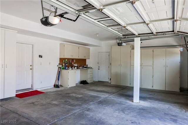 2208 Fiero Dr, Las Vegas, NV 89134 - garage with a garage door opener