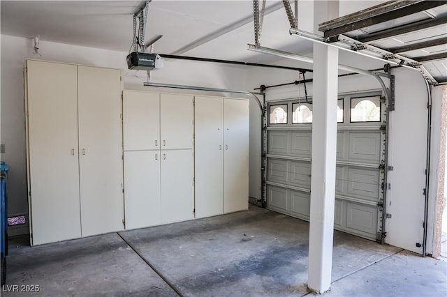 2208 Fiero Dr, Las Vegas, NV 89134 - garage featuring a garage door opener