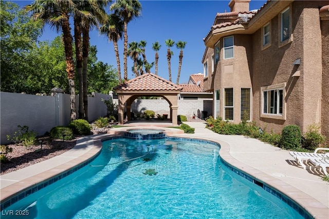 2208 Fiero Dr, Las Vegas, NV 89134 - view of swimming pool featuring a gazebo and a pool with connected hot tub