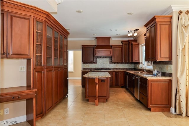 2208 Fiero Dr, Las Vegas, NV 89134 - kitchen featuring custom exhaust hood, decorative backsplash, gas stovetop, ornamental molding, and light stone counters